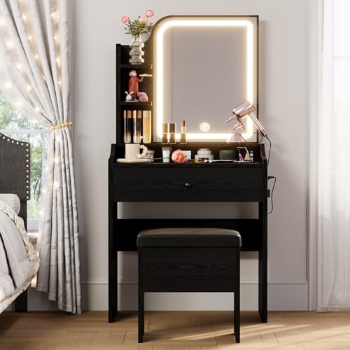 LIKIMIO Small Vanity Desk with Mirror Lights and Storage Stool | Black compact vanity with 3 light modes, charging station, storage drawer, 3 shelves and upholstered stool