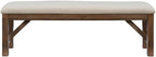 Pemberly Row 60" Wood/Fabric Bench, Rustic Umber Brown Finish, Tan Upholstered Seat, Durable Rubberwood Construction, Transitional Style Bench for Dining Room or Entryway Seating