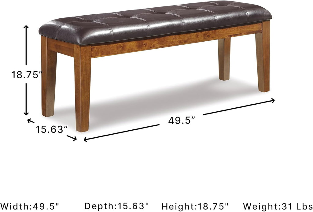 Signature Design by Ashley Ralene Tufted Upholstered Dining Room Bench, Medium Brown | Plush wipe-clean faux leather cushion, Frame of veneers, wood and engineered wood, Versatile 2-person entryway seating
