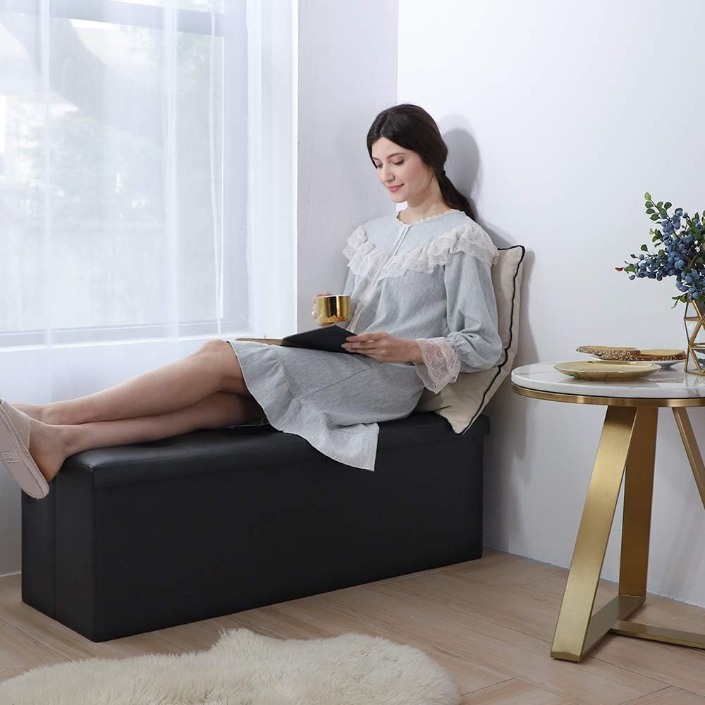 Camabel 43 Inch Folding Storage Ottoman Bench 125L Hold up 700lbs Ottoman with Storage Chest Foam Seat Padded Foot Rest Stool Faux Leather Bedroom Bench with Storage Coffee Table Black