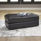 Signature Design by Ashley Amiata Black Leather and Faux Leather Ottoman, Fully Assembled Coffee Table Alternative, Rectangular Footrest Bench for Living Room, Onyx, 44" W x 24" D x 17" H