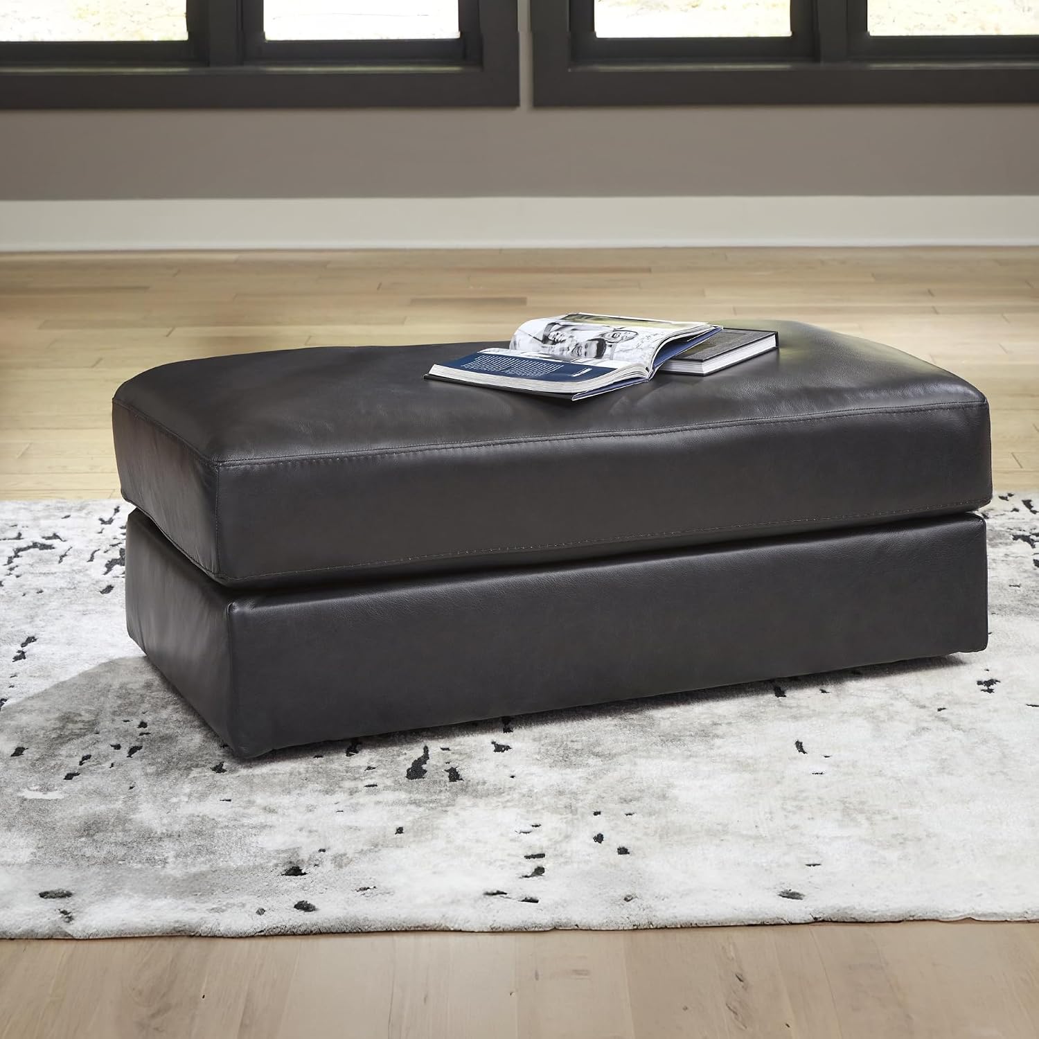Signature Design by Ashley Amiata Black Leather and Faux Leather Ottoman, Fully Assembled Coffee Table Alternative, Rectangular Footrest Bench for Living Room, Onyx, 44" W x 24" D x 17" H