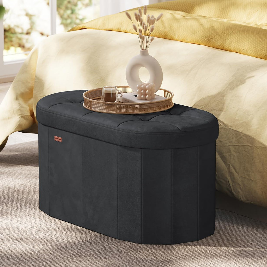 SONGMICS Mazie Collection - Folding Ottoman with Storage, Oval Storage Ottoman Bench, for Living Room, Bedroom, Velvet Fabric, 15 x 30 x 15 Inches, Ink Black ULSF267BH01