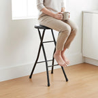 Portable Folding Metal Stool with Non-Slip Rubber Feet, Lightweight Compact Stool for Kitchen, Bar, Classroom, and Camping, Space-Saving Foldable Design with Padded Seat, Supports 200 lbs, Black