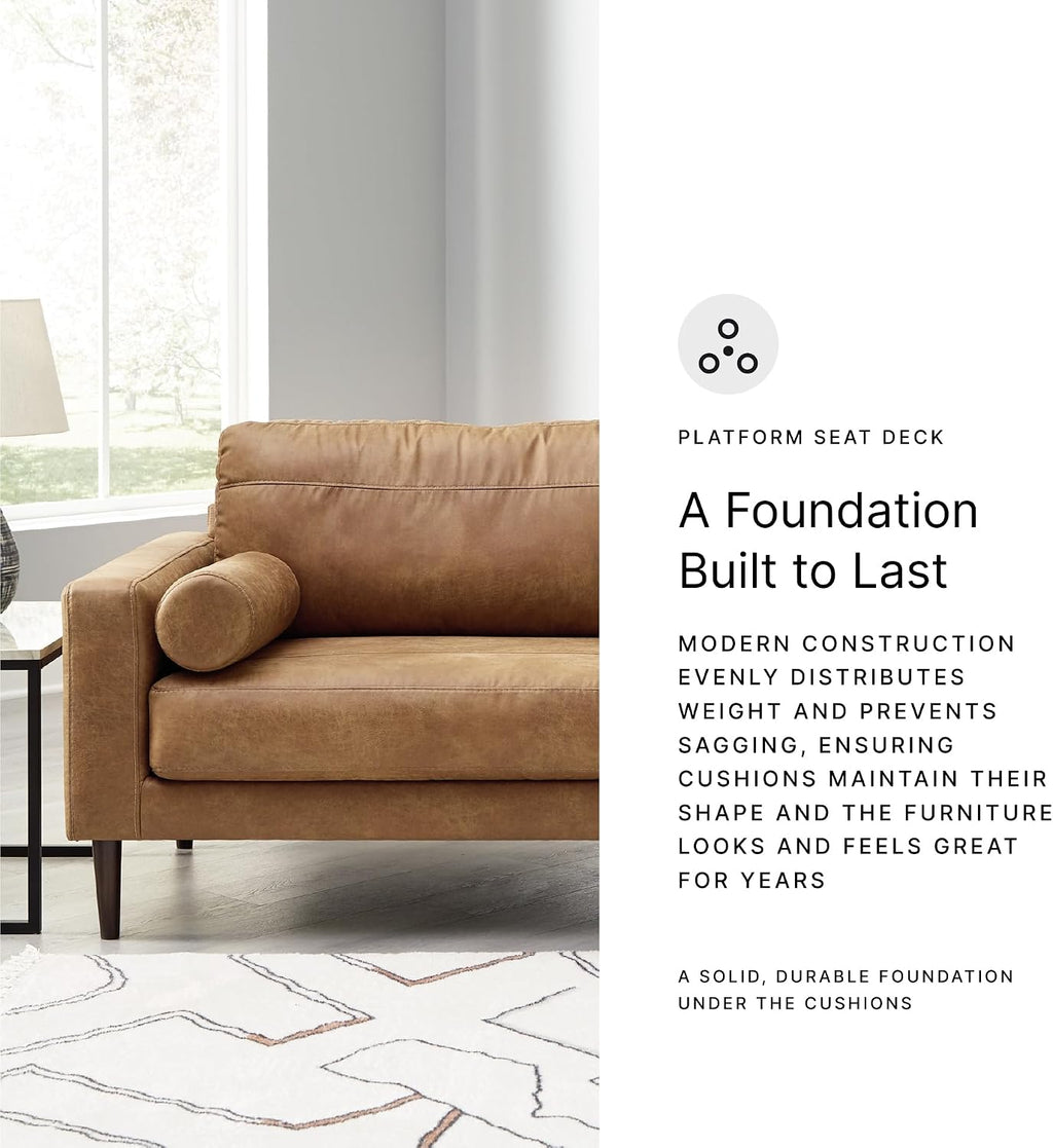 Signature Design by Ashley Telora Faux Leather 3 Seater Sofa Couch, Caramel | Medium plush fiber-wrapped foam seating, Track arms, Loose back cushions, Mid-century modern style