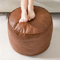 HIGOGOGO Round Stuffed Pouf Ottoman, Pu Leather Poufs with Foam Chunk Filling, Furry and Fluffy Pouf Foot Stool Storage Ottoman, 20 X 15 Floor Poufs Foot Rest for Living Room,Brown
