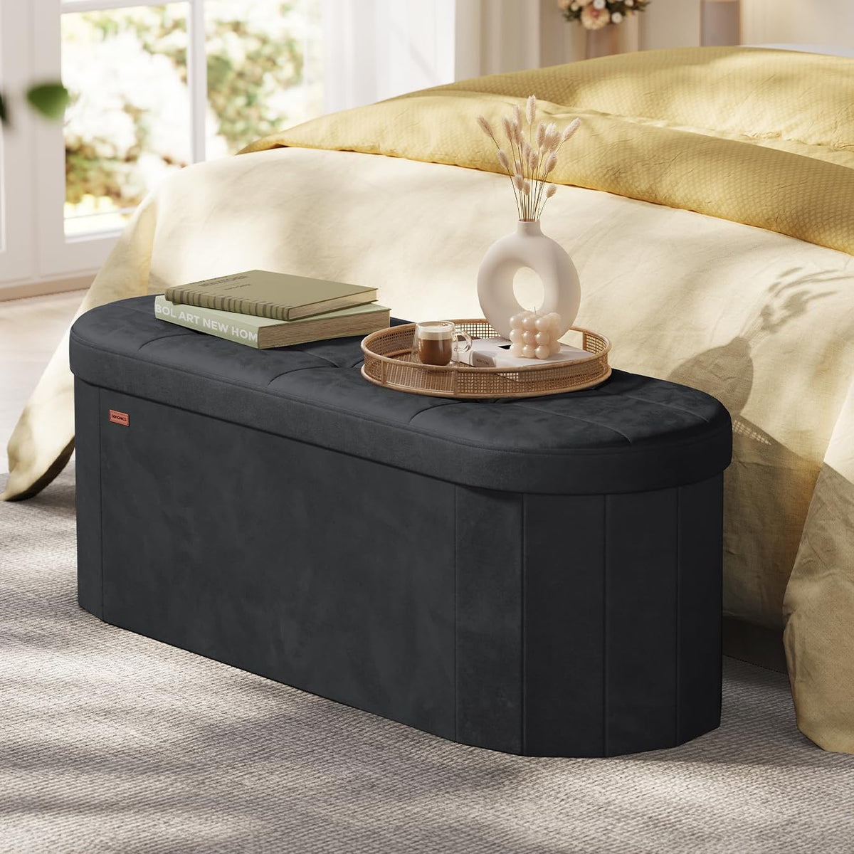 SONGMICS Mazie Collection - Folding Ottoman with Storage, Oval Storage Ottoman Bench, for Living Room, Bedroom, Velvet Fabric, 15 x 43 x 15 Inches, Ink Black ULSF297BH01