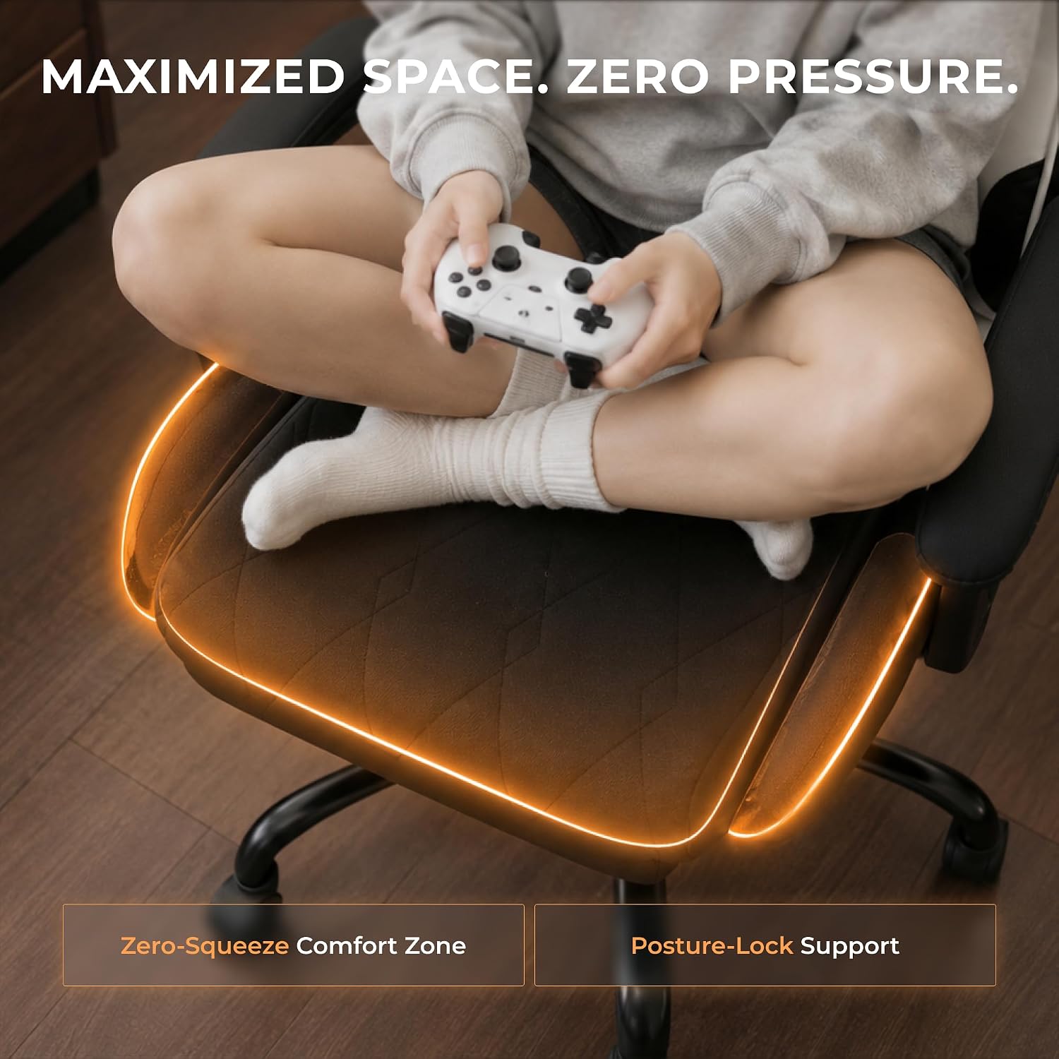 Dowinx Gaming Chair with Footrest, Ergonomic Office Chair, Black White | PU leather over high-density foam with lumbar support; steel frame holds 300 lbs; built for WFH, study, and napping