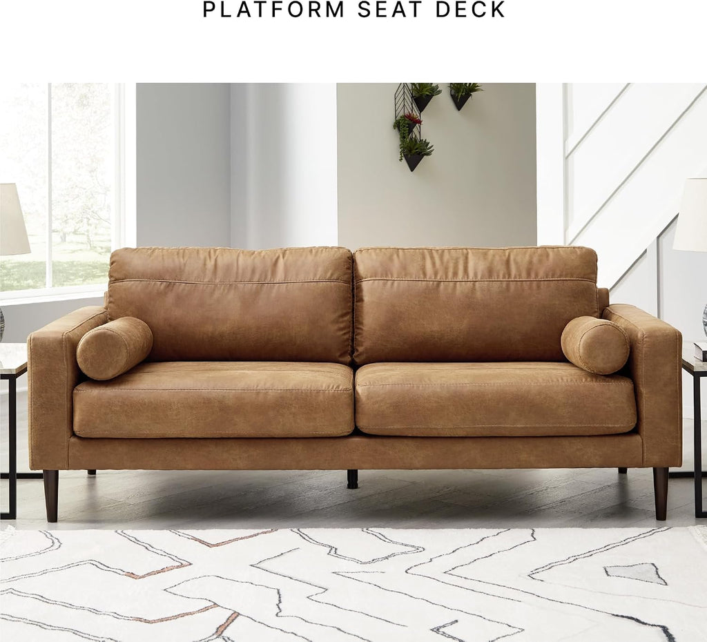 Signature Design by Ashley Telora Faux Leather 3 Seater Sofa Couch, Caramel | Medium plush fiber-wrapped foam seating, Track arms, Loose back cushions, Mid-century modern style