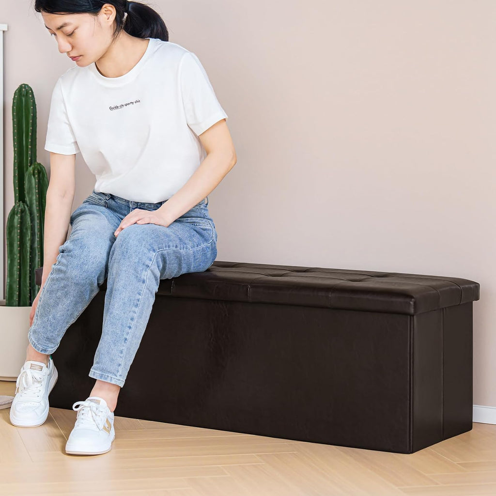 PINPLUS Folding Storage Ottoman Bench, Brown Faux Leather | Storage Chest with Comfortable Seat, Footrest Stool and Bench for Bedroom, Hallway and Living Room, 43.3 Inch