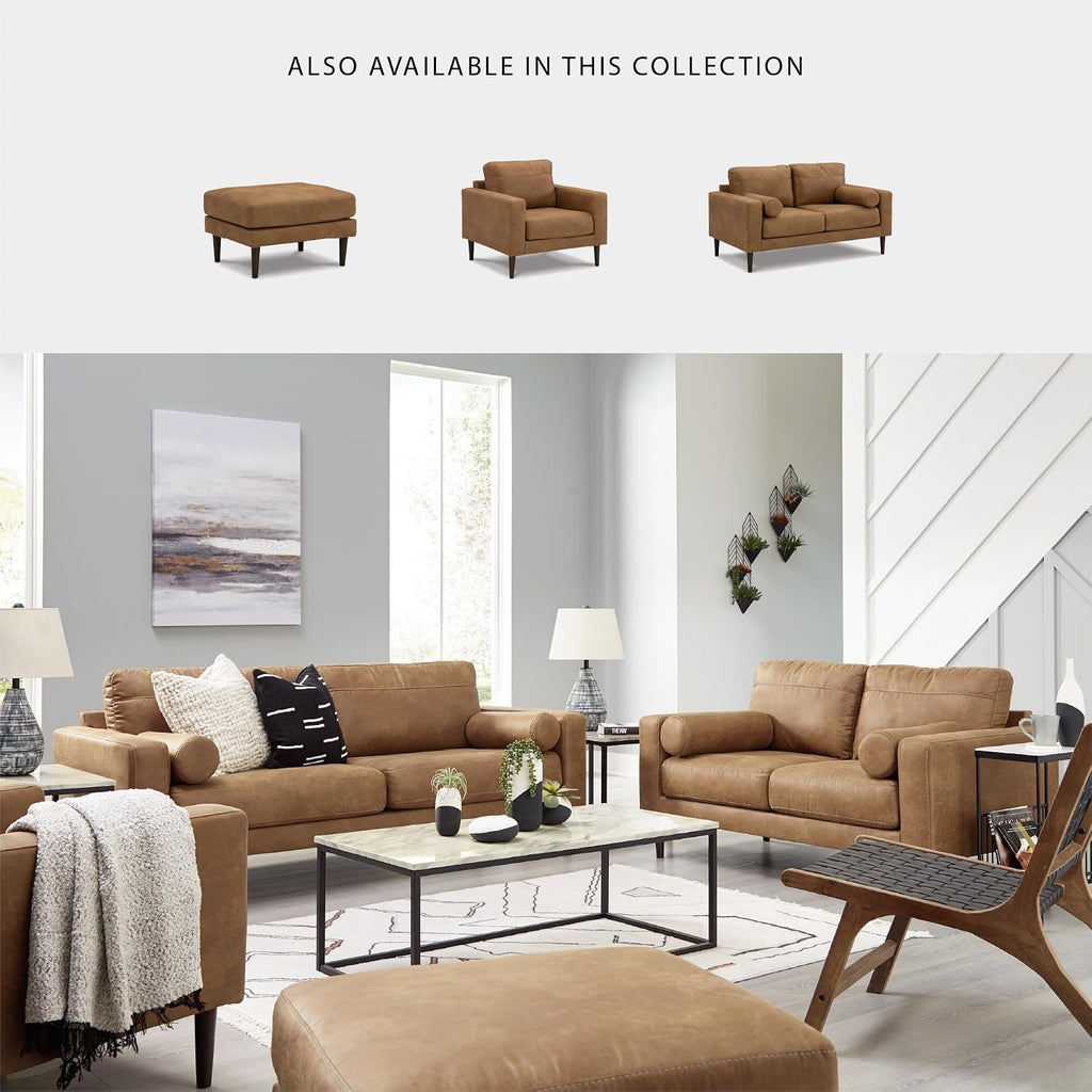 Signature Design by Ashley Telora Faux Leather 3 Seater Sofa Couch, Caramel | Medium plush fiber-wrapped foam seating, Track arms, Loose back cushions, Mid-century modern style