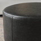 KINWELL Modern Faux Leather Round Upholstered Ottoman, Multi-Functional Sofa Footrest, Side Table, Extra Seating for Living Room, Bedroom (Black, 24" D x 24" W x 13" H)