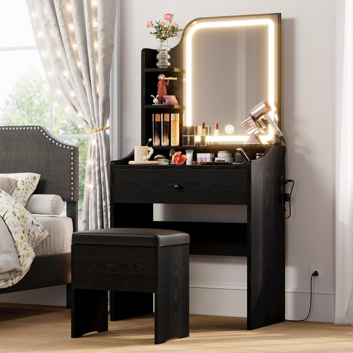 LIKIMIO Small Vanity Desk with Mirror Lights and Storage Stool | Black compact vanity with 3 light modes, charging station, storage drawer, 3 shelves and upholstered stool