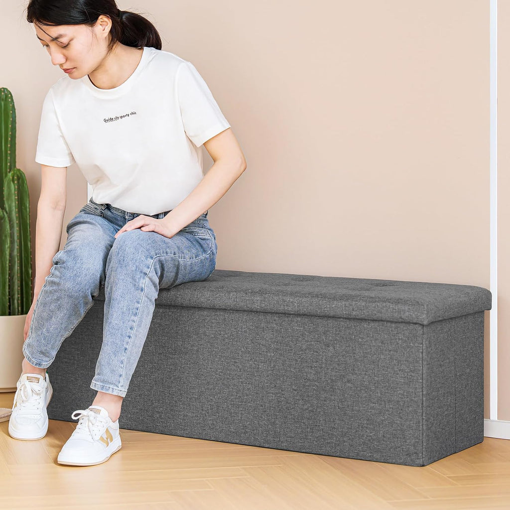 PINPLUS Folding Storage Ottoman Bench, Grey Linen | Linen Storage Chest with Padded Seat, Blanket Organizer, Footrest Stool and End of Bed Bench for Bedroom or Living Room