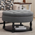 Round Storage Ottoman Coffee Table with Shelf, Fabric Dark Gray | Multi-functional gray tufted fabric ottoman coffee table with hidden storage, bottom shelf & classic nailhead trim