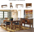 Signature Design by Ashley Ralene Tufted Upholstered Dining Room Bench, Medium Brown | Plush wipe-clean faux leather cushion, Frame of veneers, wood and engineered wood, Versatile 2-person entryway seating