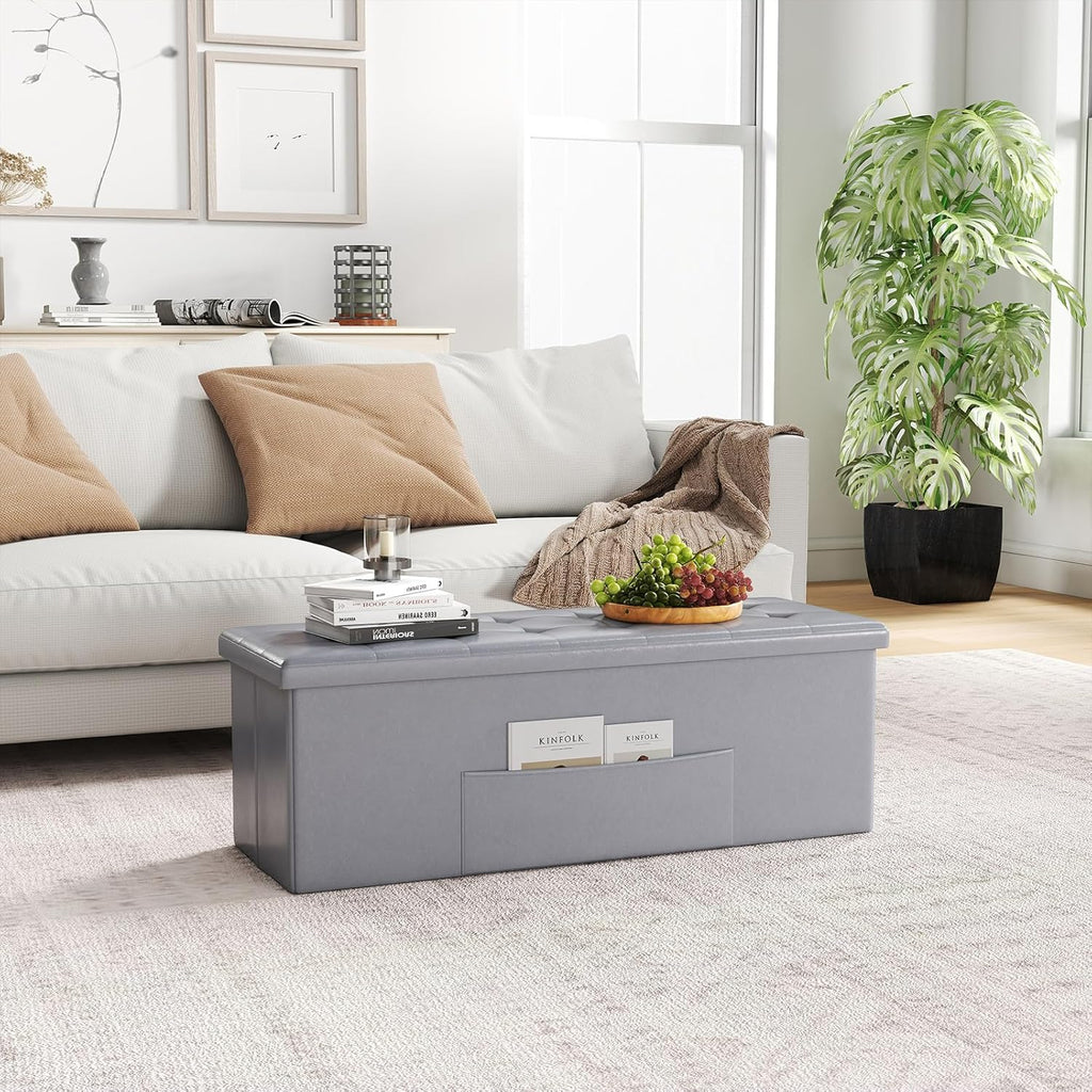 Giantex 43 Inches Folding Storage Ottoman Bench, Upholstered PU Leather Storage Chest with Side Pocket, Padded Seat, End of Bed Bench, Collapsible Ottoman Foot Rest for Living Room, Bedroom & Entryway