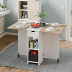 Mondeer Folding Dining Table with Drawer and Shelves, Oak & White | Drop Leaf Kitchen Table with 1 Drawer and 2 Storage Shelves in Modern Style for Small Spaces and Seats 4-6 People.