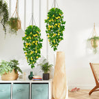 BLEUM CADE Artificial Hanging Flowers for Outdoors, 2pcs Fake Hanging Plants Pothos Vines with Yellow Flowers for Wall Home Living Room Indoor Outdoor Decor (No Baskets)