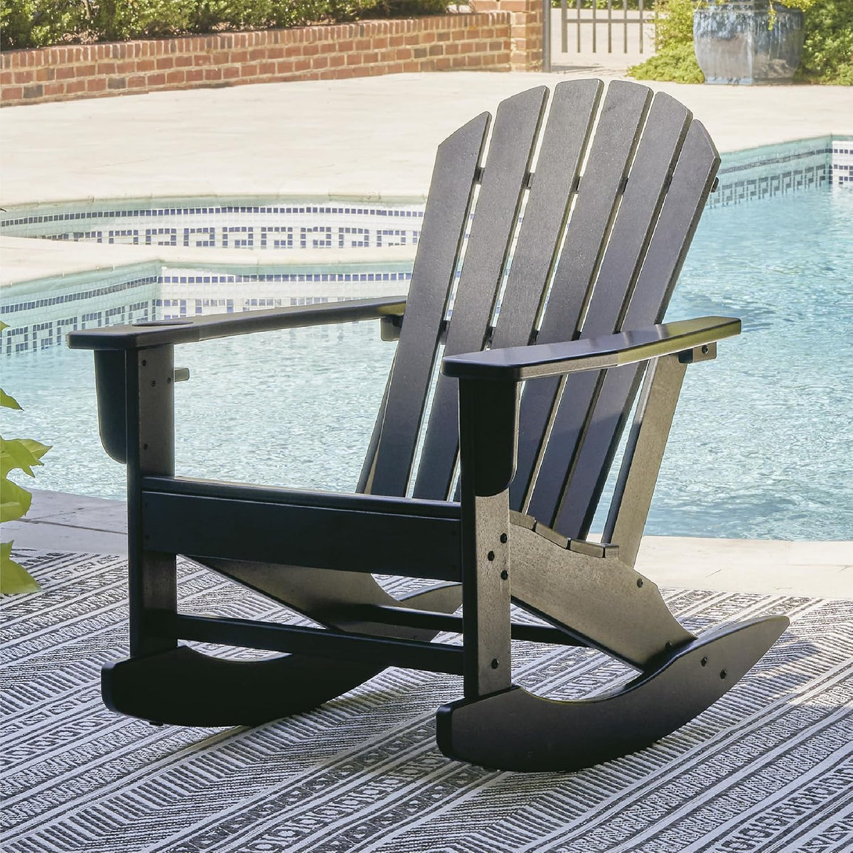 Signature Design by Ashley Sundown Treasure Outdoor Rocking Chair in Black, All-Weather Adirondack Patio Rocker, Durable Weather Resistant HDPE, 250 lb Capacity, 1 Built-In Cup Holder
