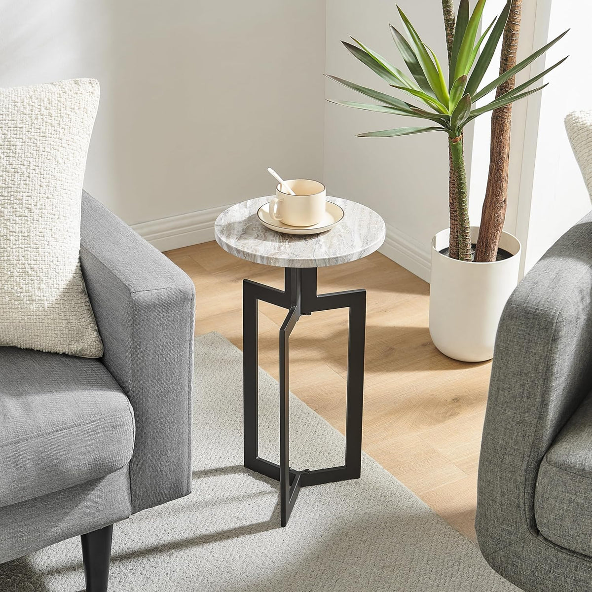 Danya B Black Metal Sculptural Pedestal & Faux Stone Tabletop Accent End Table