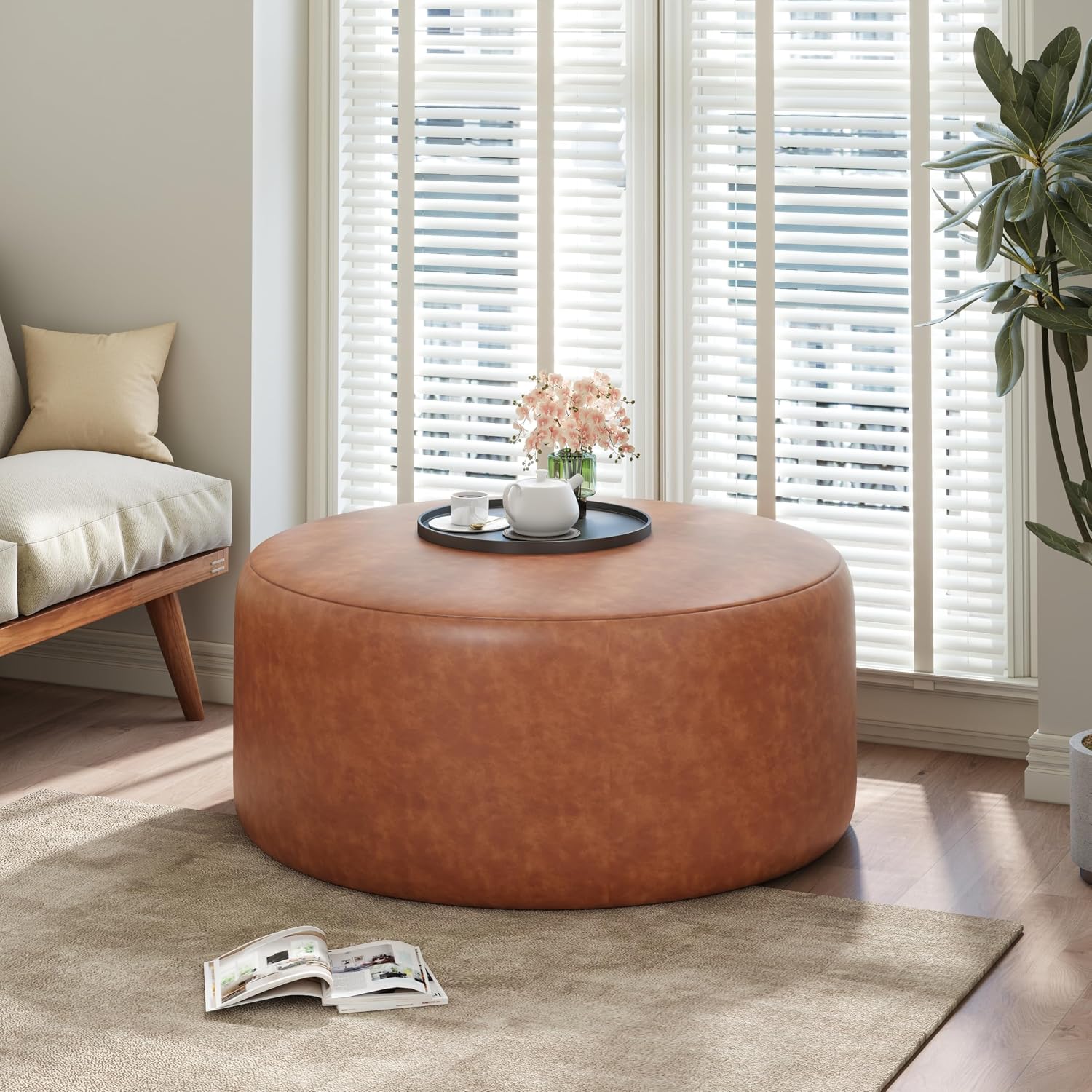 Merax 30.25" Modern Upholstered Round PU Leather Ottoman, Multifunctional Extra Seat, Side Table, Foot Rest, Stuffed Pouf Footstool for Living Room Bedroom, Cognac Brown