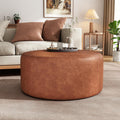 Merax 30.25" Modern Upholstered Round PU Leather Ottoman, Multifunctional Extra Seat, Side Table, Foot Rest, Stuffed Pouf Footstool for Living Room Bedroom, Cognac Brown