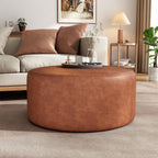 Merax 30.25" Modern Upholstered Round PU Leather Ottoman, Multifunctional Extra Seat, Side Table, Foot Rest, Stuffed Pouf Footstool for Living Room Bedroom, Cognac Brown