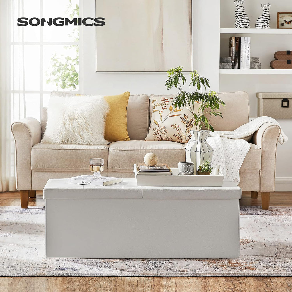 SONGMICS 43.3 Inches Folding Storage Ottoman Bench with Flipping Lid | Storage Chest Footrest Padded Seat, Iron Frame Support, Cloud White and Ink Black, MINOTA Collection ULSF75WT