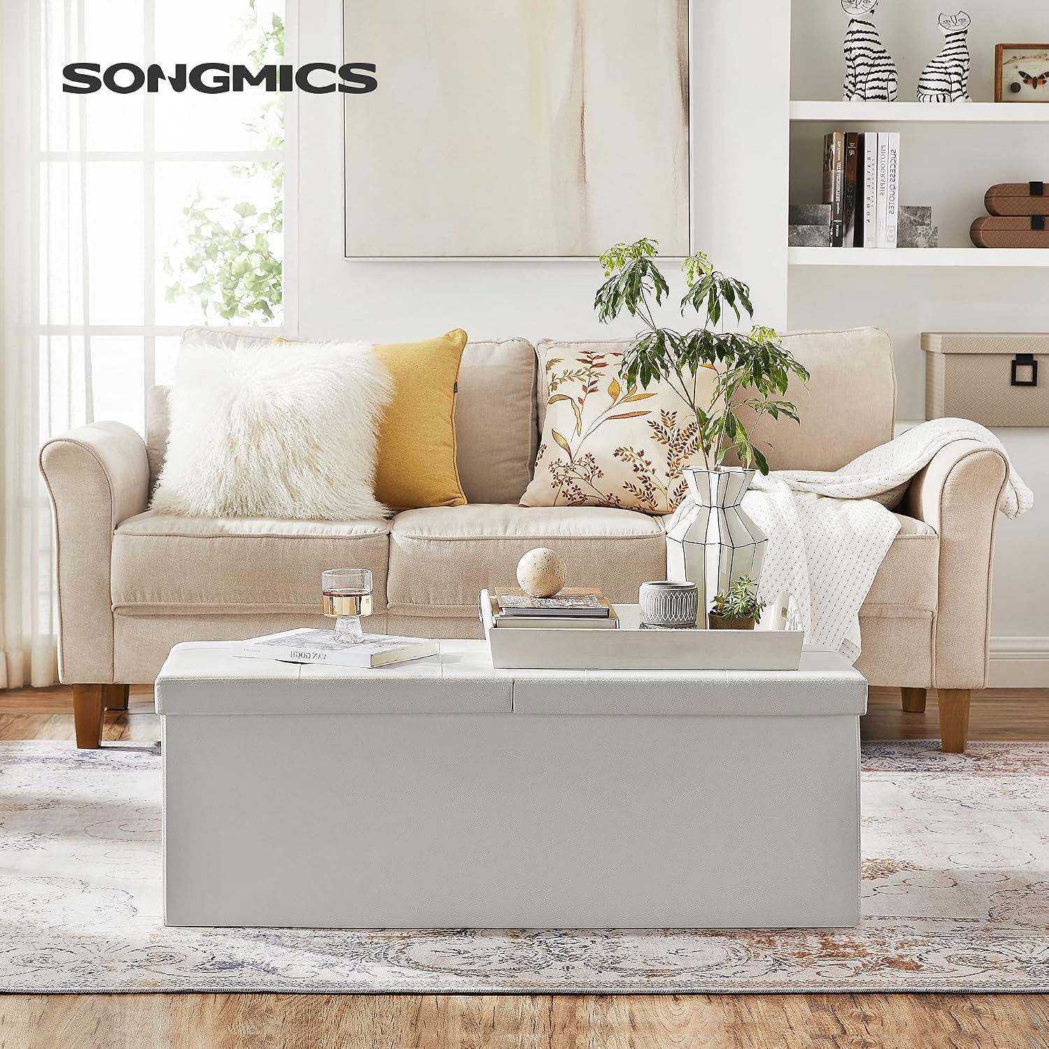 SONGMICS 43.3 Inches Folding Storage Ottoman Bench with Flipping Lid | Storage Chest Footrest Padded Seat, Iron Frame Support, Cloud White and Ink Black, MINOTA Collection ULSF75WT