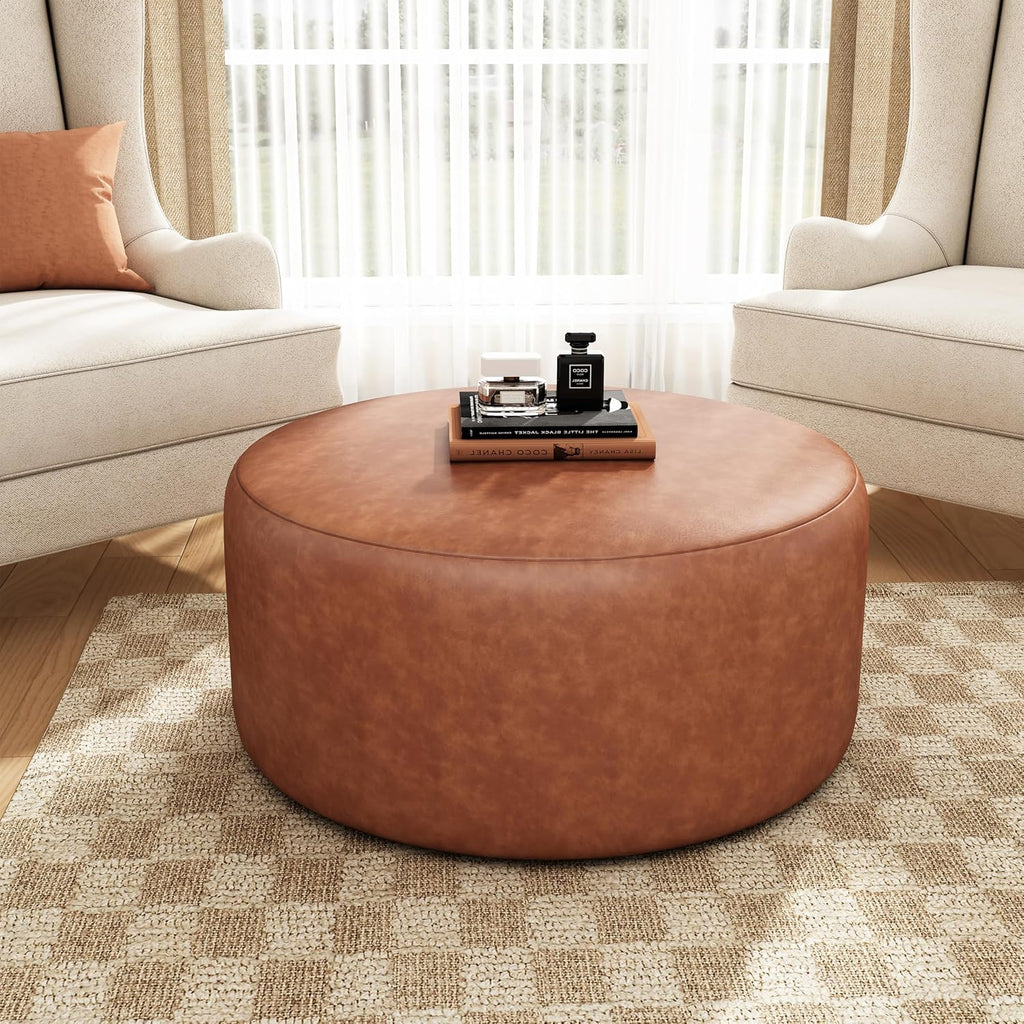 Merax 30.25" Modern Upholstered Round PU Leather Ottoman, Multifunctional Extra Seat, Side Table, Foot Rest, Stuffed Pouf Footstool for Living Room Bedroom, Cognac Brown