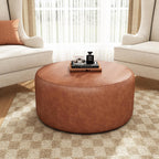 Merax 30.25" Modern Upholstered Round PU Leather Ottoman, Multifunctional Extra Seat, Side Table, Foot Rest, Stuffed Pouf Footstool for Living Room Bedroom, Cognac Brown
