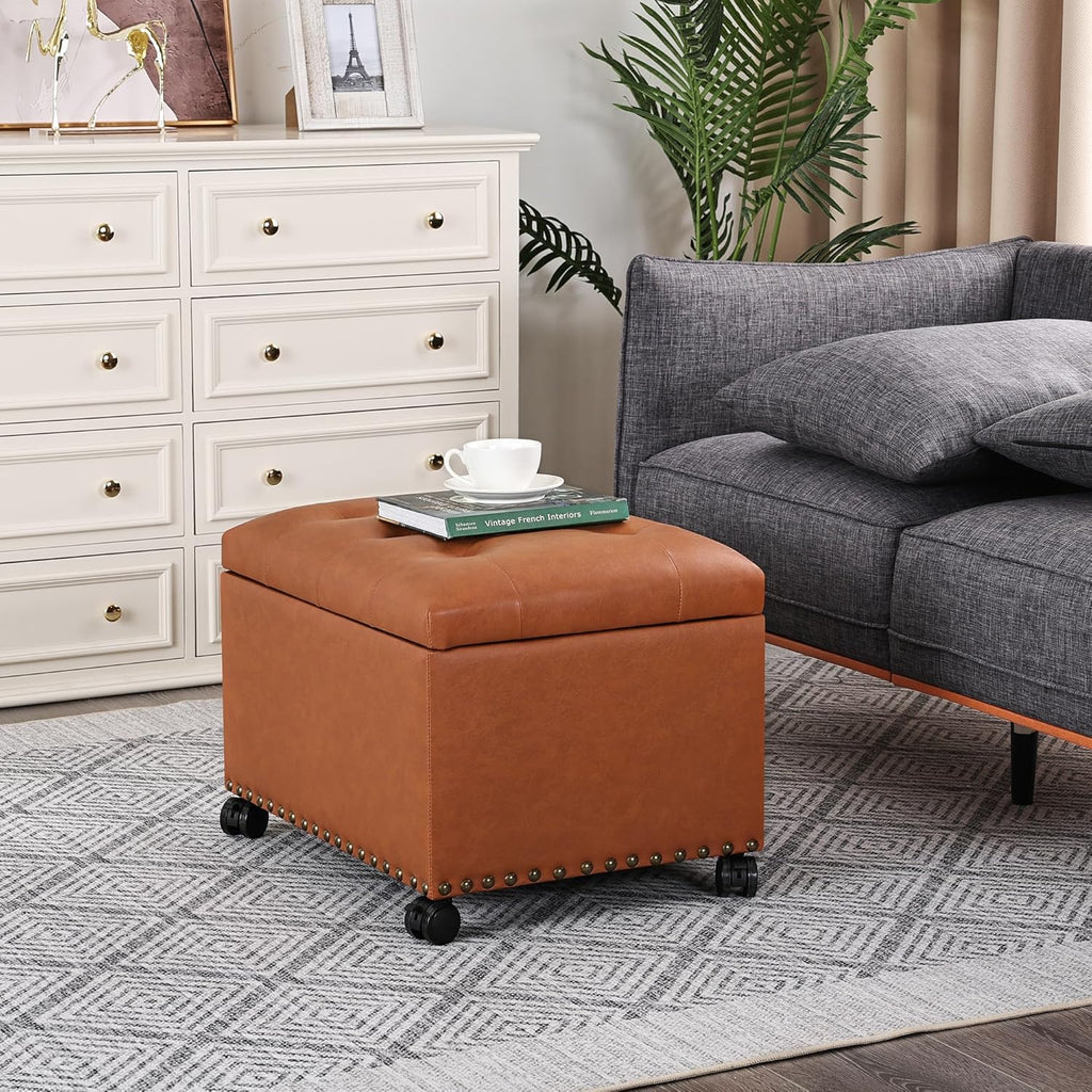 Joveco PU Leather Rolling Storage Ottoman, 24" Tufted Lid, Nailhead Trim & Hidden Storage,Elegant Footrest & Organizer on Caster Wheels for Living Room, Bedroom, Entryway(Orange Brown,Wheels)