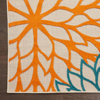 Nourison Home Aloha 7' x 10' Fabric Indoor/Outdoor Rug in Green/Multi-Color